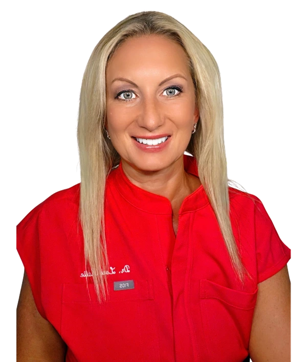 Dr. Lori Kalie Dr. Lori Kalie smiling, wearing a red top