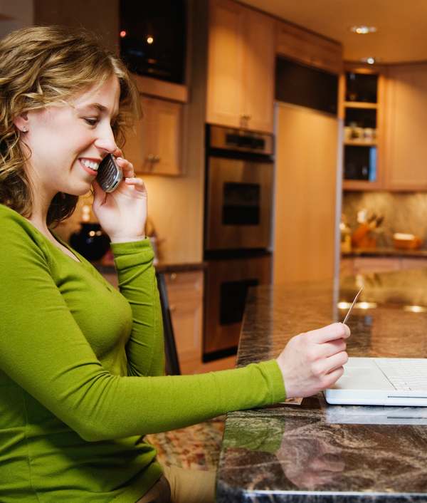 Dr. Lori Kalie on a video consultation call at her desk
